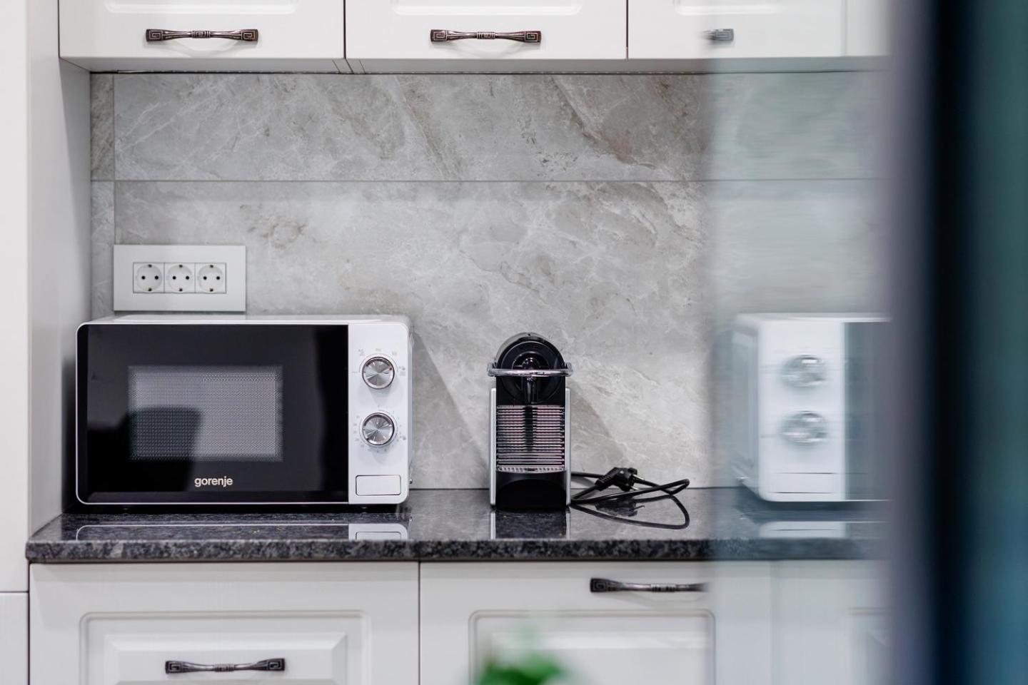 The Corner Luxe Apartment Bukares Bagian luar foto